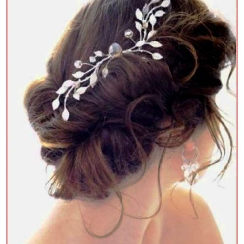 Messy Bun Wedding Hairstyles (Photo 2 of 15)
