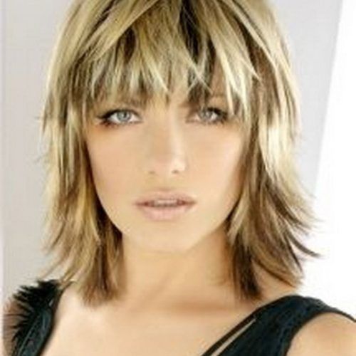 Choppy Shag Hairstyles With Short Feathered Bangs (Photo 3 of 20)