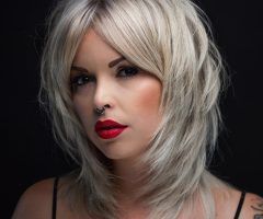 20 Collection of Edgy Platinum Feathered Shag Haircuts