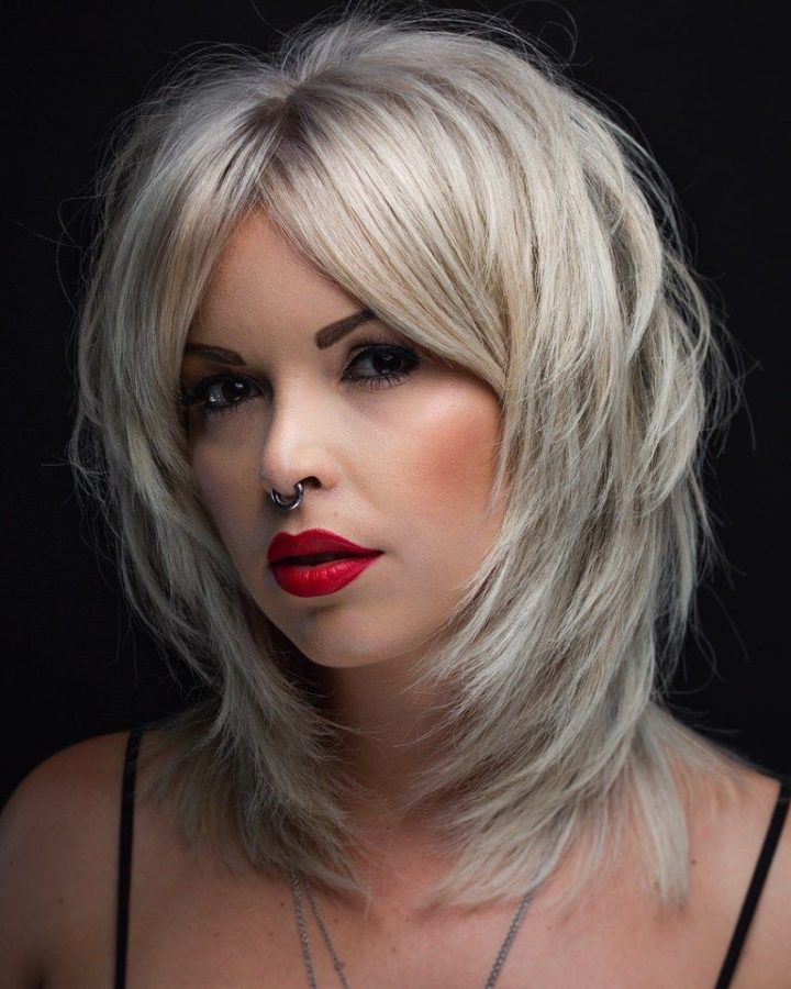 20 Collection of Edgy Platinum Feathered Shag Haircuts