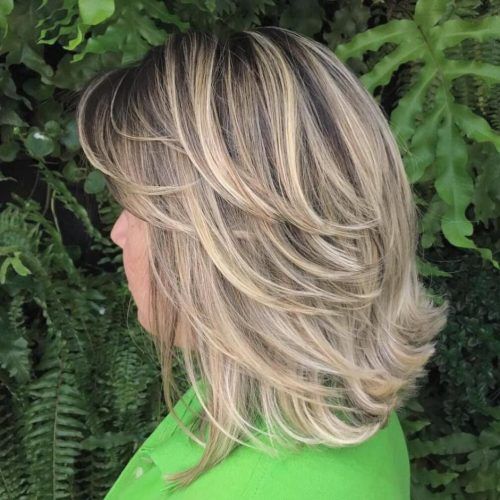 Flipped Lob Hairstyles With Swoopy Back-Swept Layers (Photo 1 of 20)