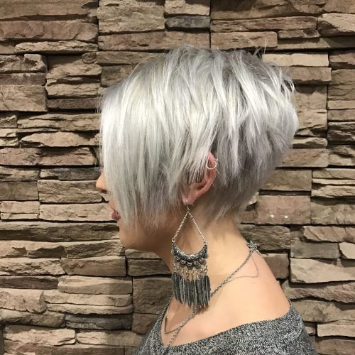 Flipped Up Platinum Blonde Pixie Haircuts (Photo 8 of 20)