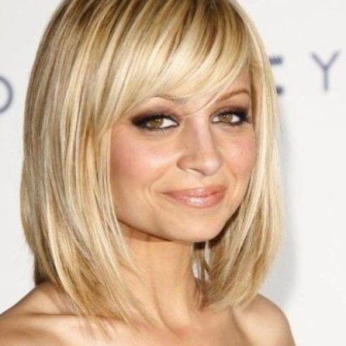 Side-Swept Bangs With Shoulder-Length Hair (Photo 12 of 15)