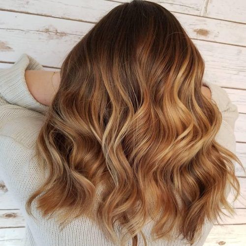Sun-Kissed Blonde Hairstyles With Sweeping Layers (Photo 17 of 20)