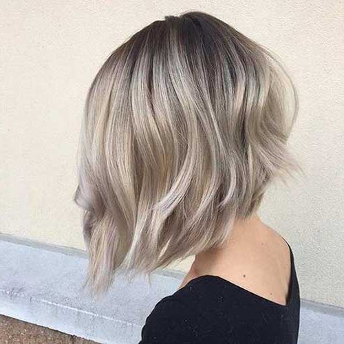 Ash Blonde Short Curls Hairstyles (Photo 6 of 20)