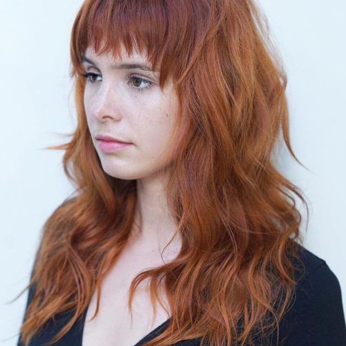 Asymmetrical Copper Feathered Bangs Hairstyles (Photo 6 of 20)