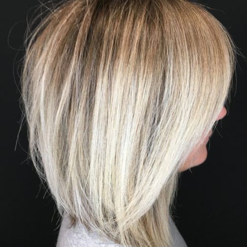 Blonde Textured Haircuts With Angled Layers (Photo 4 of 20)