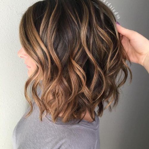 Painted Golden Highlights On Brunette Curls Hairstyles (Photo 19 of 20)
