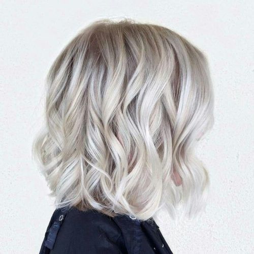 Pearl Blonde Bouncy Waves Hairstyles (Photo 14 of 20)