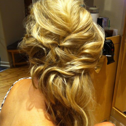 Twisted And Pinned Half Up Wedding Hairstyles (Photo 11 of 20)