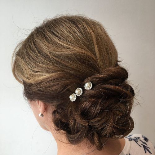 Low Twisted Bun Wedding Hairstyles For Long Hair (Photo 7 of 20)