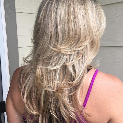 Blonde Lob Hairstyles With Disconnected Jagged Layers (Photo 20 of 20)