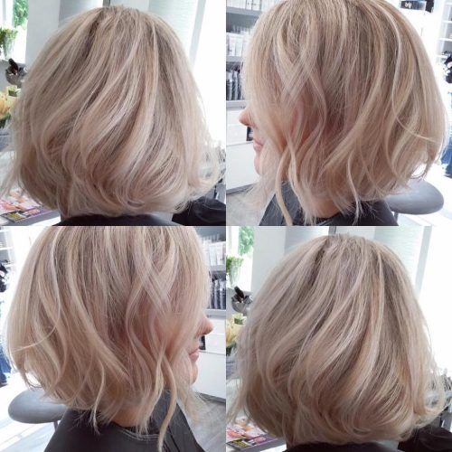 Blonde Textured Haircuts With Angled Layers (Photo 20 of 20)