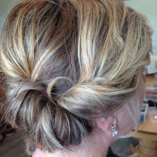 Loose Updo Wedding Hairstyles With Whipped Curls (Photo 4 of 20)