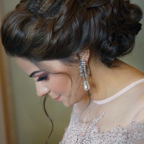 Side Bun Prom Hairstyles With Black Feathers (Photo 8 of 20)