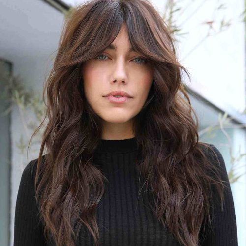 Loose Waves With Unshowy Curtain Bangs (Photo 9 of 15)