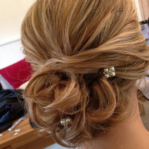 Curly Side Bun Wedding Hairstyles (Photo 13 of 15)
