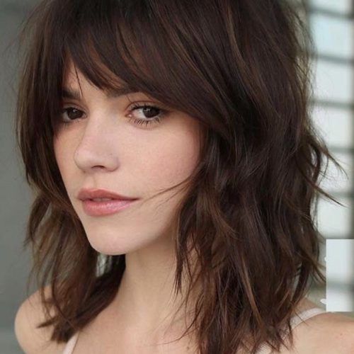 Medium Brunette Shag Haircuts With Thick Bangs (Photo 4 of 20)