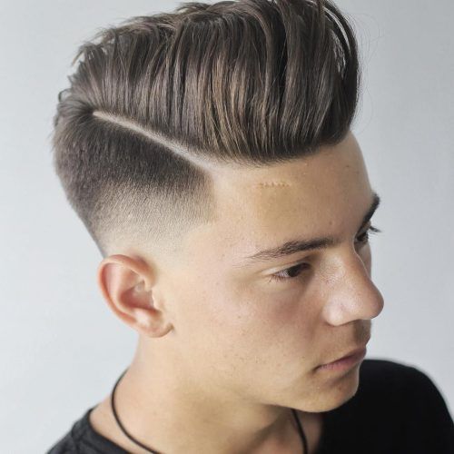 Mohawk Haircuts On Curls With Parting (Photo 8 of 20)
