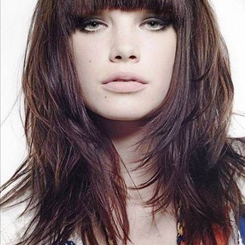 Medium Length Haircuts With Arched Bangs (Photo 4 of 20)
