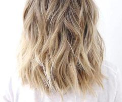 20 Best Waves Haircuts with Blonde Ombre