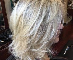 2024 Popular Voluminous Wispy Lob Hairstyles with Feathered Layers