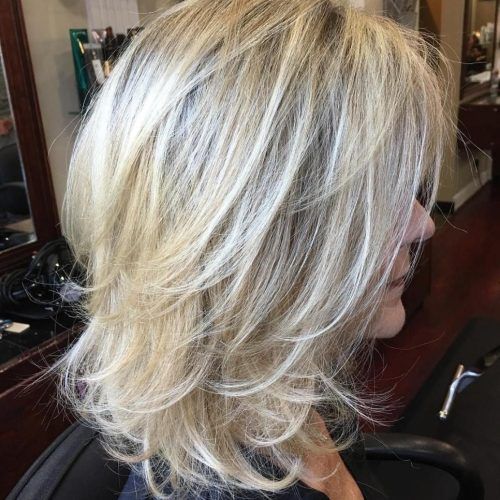 Voluminous Wispy Lob Hairstyles With Feathered Layers (Photo 1 of 20)