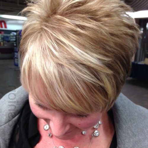 Curly Pixie Hairstyles With Light Blonde Highlights (Photo 20 of 20)