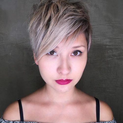 Messy Spiky Pixie Haircuts With Asymmetrical Bangs (Photo 1 of 20)