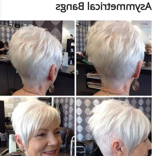 Asymmetrical Feathered Bangs Hairstyles With Short Hair (Photo 7 of 20)