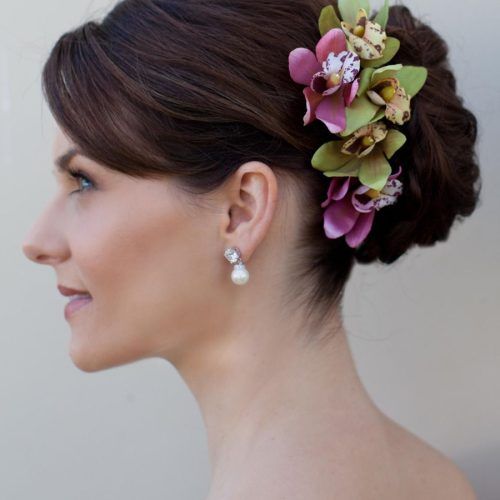 Curly Wedding Hairstyles With An Orchid (Photo 12 of 20)