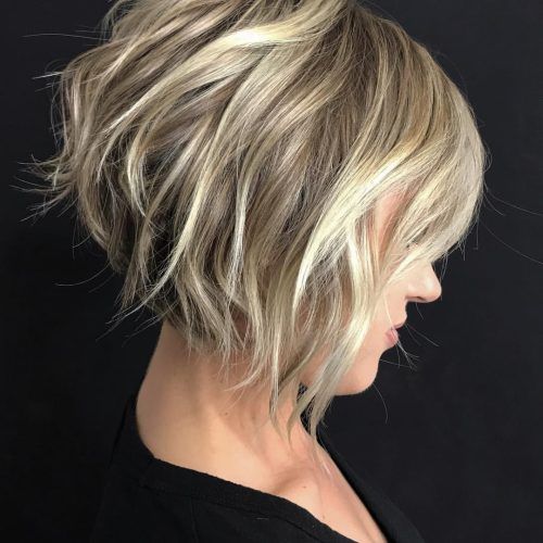 Dynamic Tousled Blonde Bob Hairstyles With Dark Underlayer (Photo 15 of 20)
