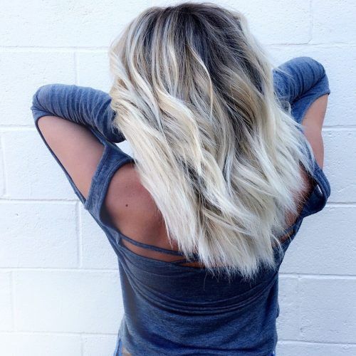 Dark Roots And Icy Cool Ends Blonde Hairstyles (Photo 11 of 20)