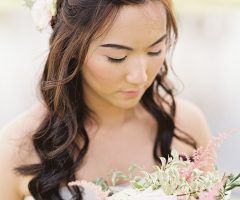 15 Photos Middle Part Wedding Hairstyles