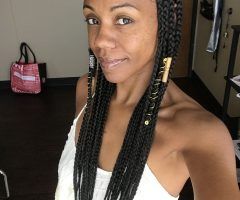 15 Best Collection of Simple Center-part Fulani Braids with a Forehead Bead
