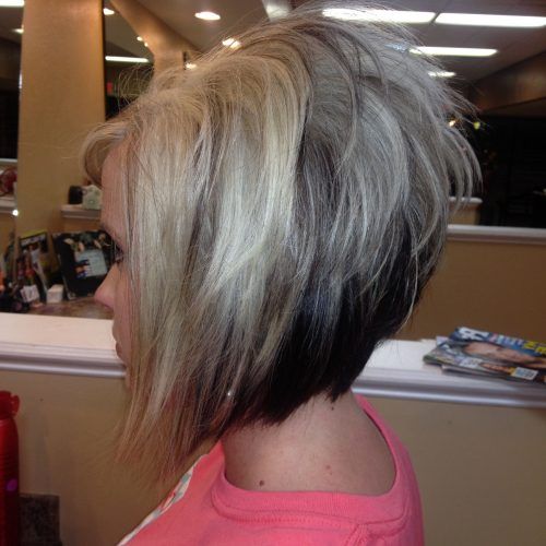 Subtle Dirty Blonde Angled Bob Hairstyles (Photo 19 of 20)
