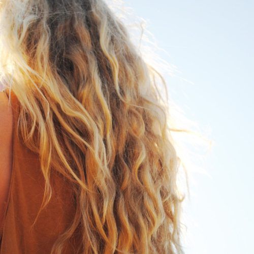 Salty Beach Blonde Layers Hairstyles (Photo 1 of 20)