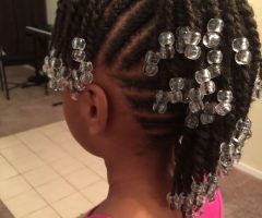 15 Inspirations Cornrows with Artistic Beaded Twisted Bun