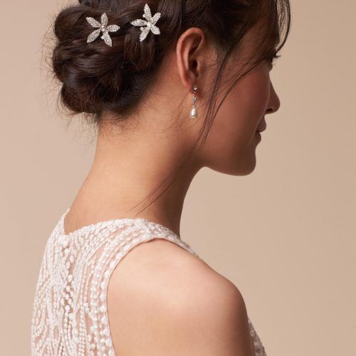 Curly Wedding Hairstyles With An Orchid (Photo 14 of 20)