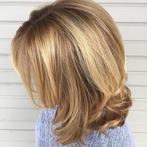 Multi-Tonal Mid Length Blonde Hairstyles (Photo 12 of 20)
