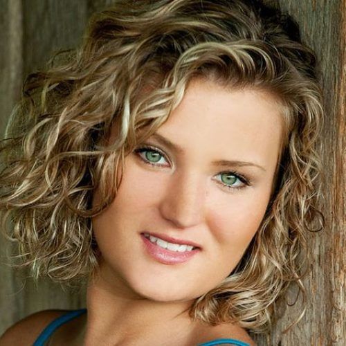 Natural Curls Hairstyles With Caramel Highlights (Photo 16 of 20)