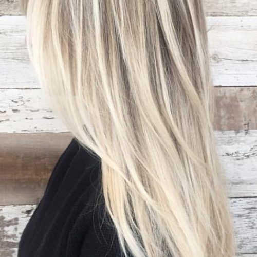 Long Pixie Hairstyles With Dramatic Blonde Balayage (Photo 12 of 20)