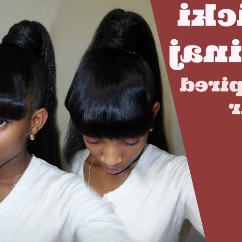 Minaj Pony Hairstyles With Arched Bangs (Photo 20 of 20)