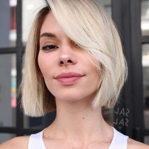 Sharp And Blunt Bob Hairstyles With Bangs (Photo 9 of 20)