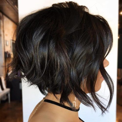 Short Asymmetric Bob Hairstyles With Textured Curls (Photo 5 of 20)