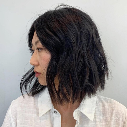 Short Asymmetric Bob Hairstyles With Textured Curls (Photo 15 of 20)