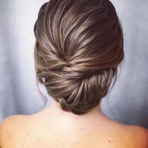 Sophisticated Pulled Back Cascade Bridal Hairstyles (Photo 11 of 20)