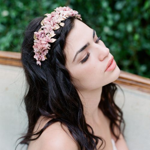Undone Low Bun Bridal Hairstyles With Floral Headband (Photo 8 of 20)