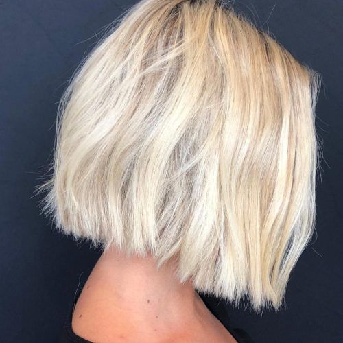 Dynamic Tousled Blonde Bob Hairstyles With Dark Underlayer (Photo 16 of 20)