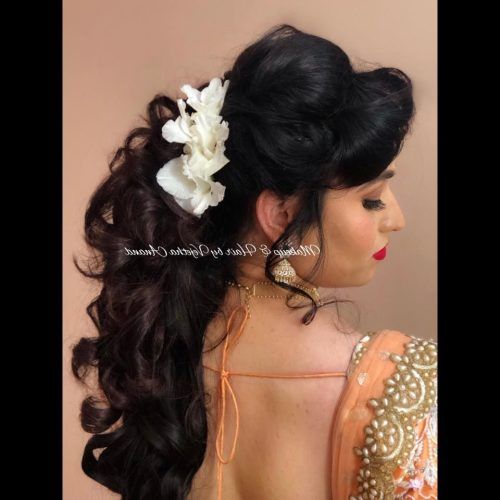 Curly Wedding Hairstyles With An Orchid (Photo 1 of 20)